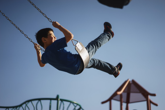 Child in a swing.